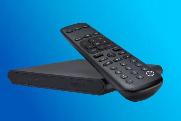 A black DIRECTV receiver box is shown with a matching black remote control resting on top of it, against a blue background.